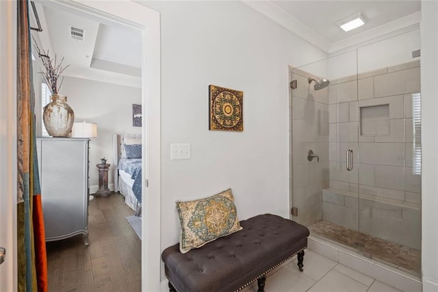 full bathroom featuring crown molding, a stall shower, ensuite bath, and visible vents