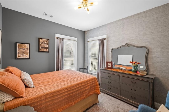 bedroom with carpet flooring and visible vents