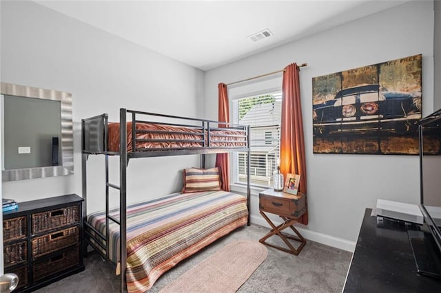 bedroom with carpet flooring, baseboards, and visible vents