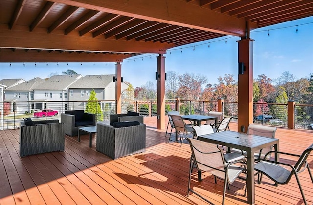 wooden deck featuring an outdoor hangout area and outdoor dining space