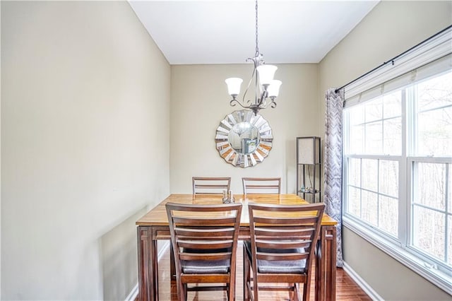 3068 Cedar Glade Ln, Buford, GA 30519 - dining area featuring wood-type flooring and a chandelier