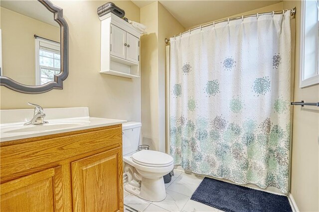 3068 Cedar Glade Ln, Buford, GA 30519 - bathroom featuring vanity and toilet