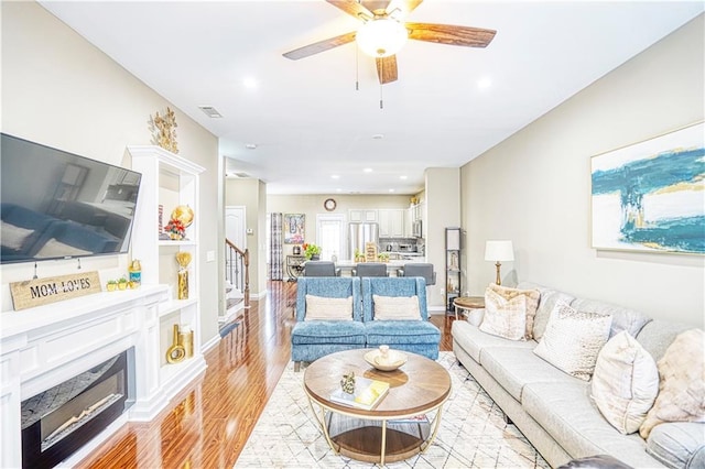 3068 Cedar Glade Ln, Buford, GA 30519 - living room with ceiling fan and light hardwood / wood-style floors
