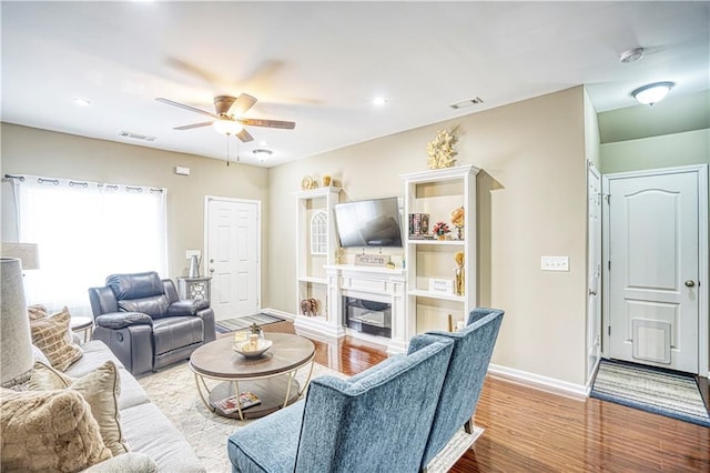 3068 Cedar Glade Ln, Buford, GA 30519 - living room with ceiling fan and light wood-type flooring