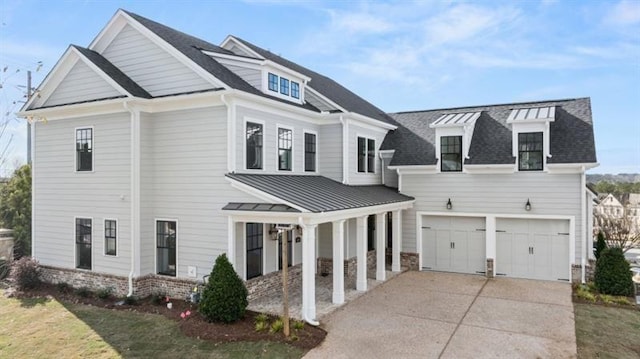 1005 Coleman Place Dr, Roswell, GA 30075 - view of front of home with driveway, a garage, a standing seam roof, and a shingled roof