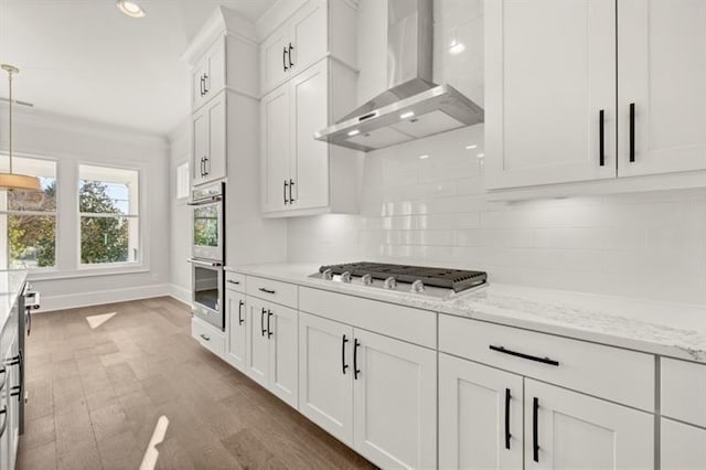 1005 Coleman Place Dr, Roswell, GA 30075 - kitchen featuring wall chimney range hood, stainless steel appliances, tasteful backsplash, white cabinetry, and dark wood-style floors