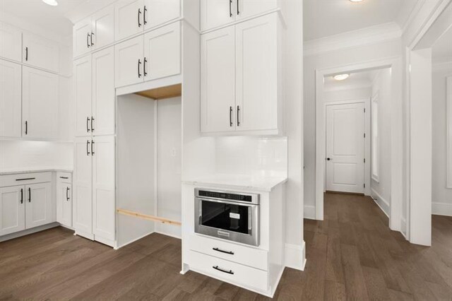 1005 Coleman Place Dr, Roswell, GA 30075 - kitchen featuring dark wood-style floors, white cabinetry, and crown molding