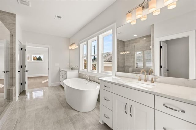 1005 Coleman Place Dr, Roswell, GA 30075 - full bath featuring two vanities, a stall shower, a freestanding bath, and french doors