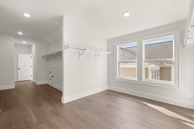 1005 Coleman Place Dr, Roswell, GA 30075 - walk in closet with wood finished floors