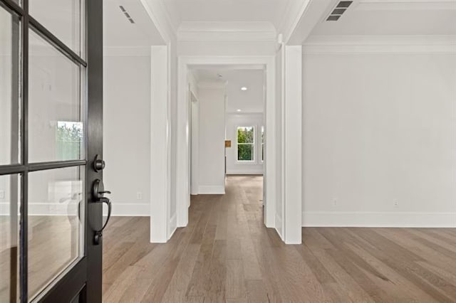 1005 Coleman Place Dr, Roswell, GA 30075 - foyer entrance with wood finished floors and ornamental molding