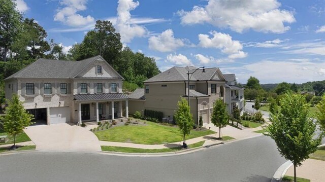 1005 Coleman Place Dr, Roswell, GA 30075 - view of front of property with a garage, covered porch, concrete driveway, and a front lawn
