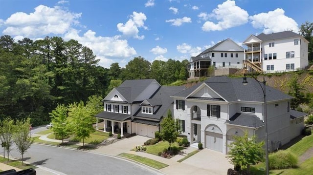 1005 Coleman Place Dr, Roswell, GA 30075 - view of front facade with a garage, concrete driveway, and a residential view