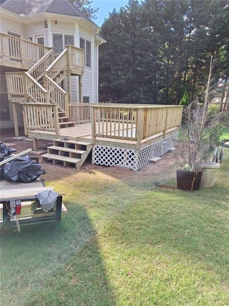 view of yard featuring a wooden deck