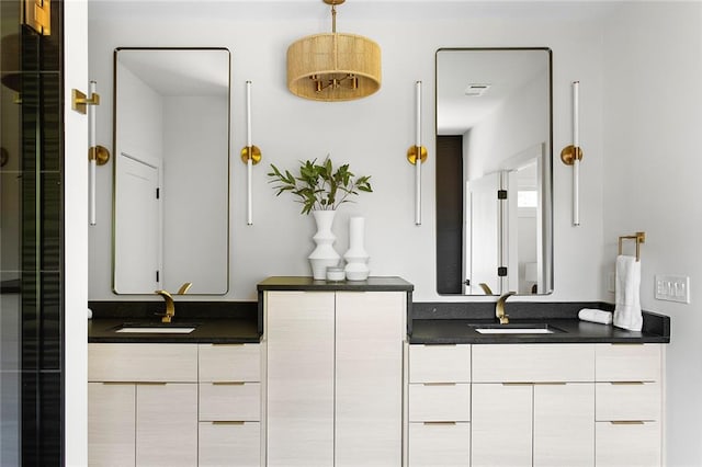 bathroom featuring dual bowl vanity