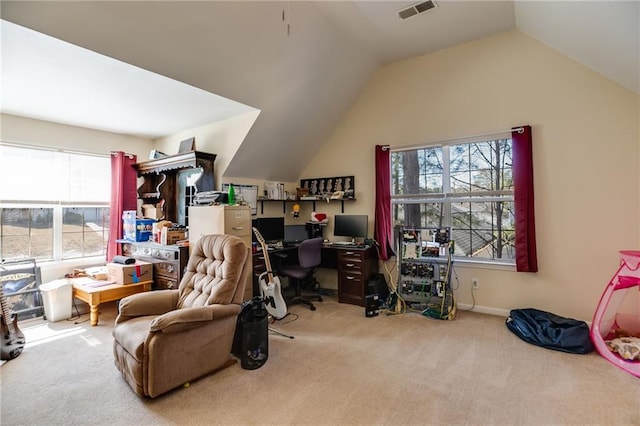 office area with vaulted ceiling, carpet floors, and visible vents