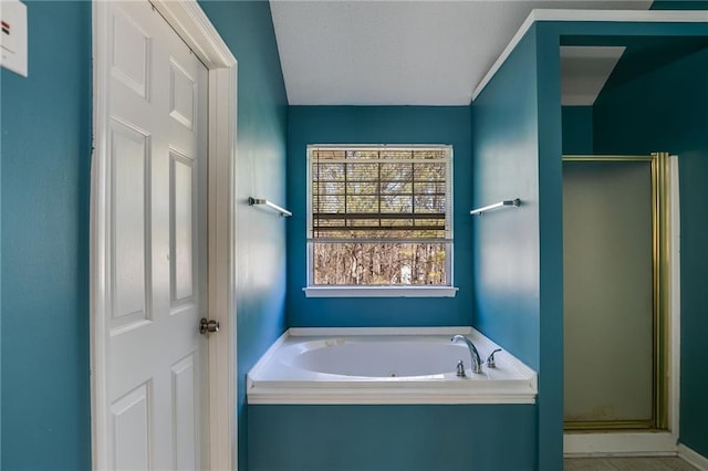 full bath featuring a whirlpool tub and a shower stall