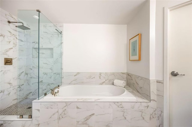 3235 Roswell Rd NE Unit 505, Atlanta, GA 30305 - full bathroom featuring a marble finish shower and a garden tub