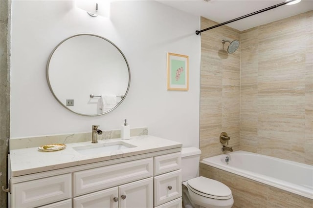 3235 Roswell Rd NE Unit 505, Atlanta, GA 30305 - bathroom featuring vanity, tiled shower / bath combo, and toilet