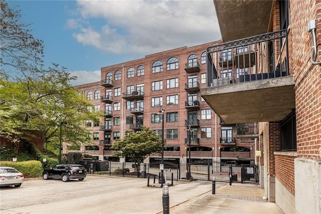 3235 Roswell Rd NE Unit 505, Atlanta, GA 30305 - view of apartment building / complex with uncovered parking