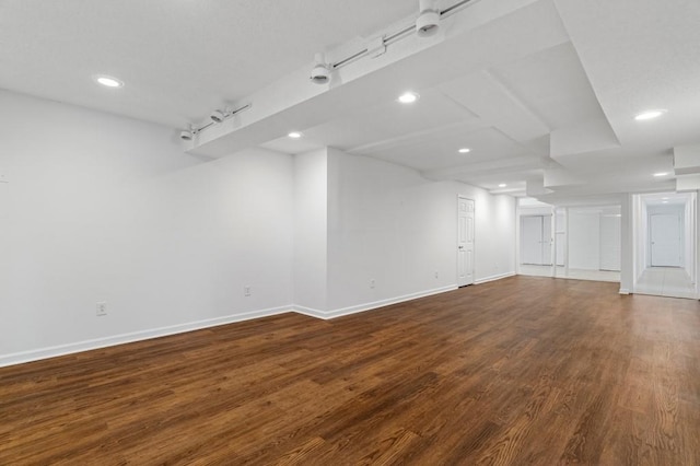 spare room with dark hardwood / wood-style flooring