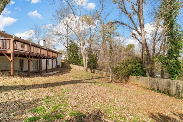 view of yard featuring a deck