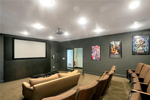 home theater room with light colored carpet