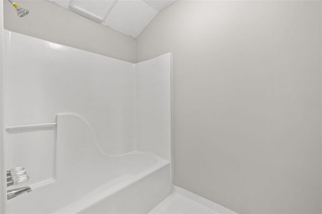 bathroom with shower / bathing tub combination