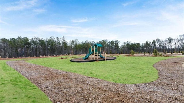 321 Sound Cir, Stockbridge, GA 30281 - view of jungle gym with a lawn