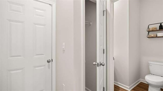 321 Sound Cir, Stockbridge, GA 30281 - bathroom featuring toilet and wood finished floors