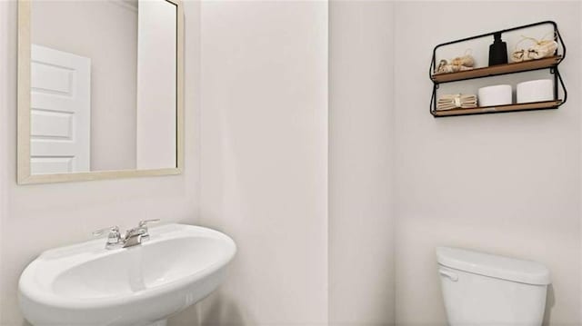 321 Sound Cir, Stockbridge, GA 30281 - bathroom featuring a sink and toilet