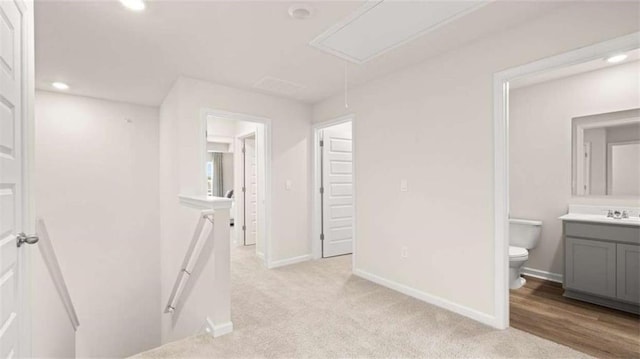 321 Sound Cir, Stockbridge, GA 30281 - hall featuring an upstairs landing, attic access, light colored carpet, and recessed lighting