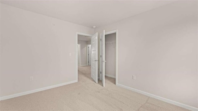321 Sound Cir, Stockbridge, GA 30281 - unfurnished room featuring light colored carpet and baseboards