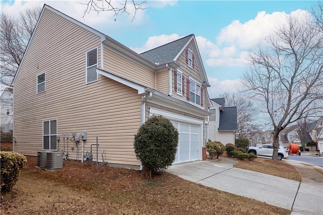 view of side of property featuring a garage