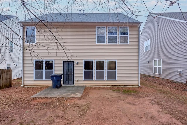 rear view of property with a patio area