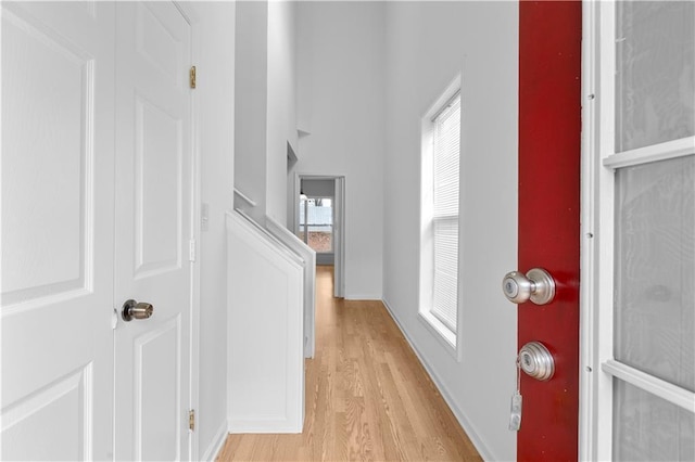 corridor featuring light wood-type flooring