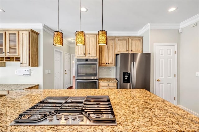 kitchen featuring crown molding, pendant lighting, light brown cabinetry, appliances with stainless steel finishes, and light stone counters