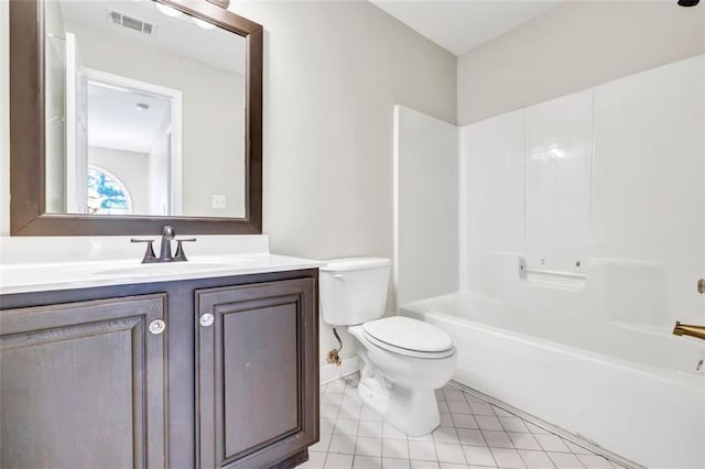 full bathroom with vanity, toilet, tile patterned flooring, and shower / bathtub combination