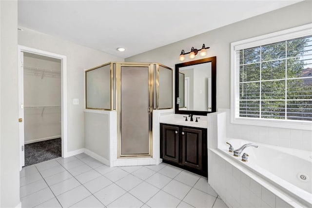 bathroom with vanity, separate shower and tub, and tile patterned flooring