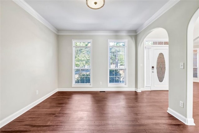 entryway featuring crown molding and dark hardwood / wood-style flooring