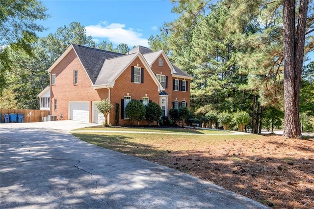 colonial home with a garage