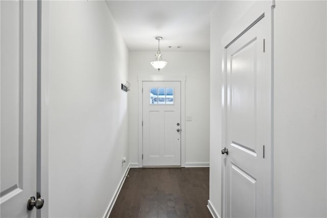 1637 Short Shadow Ln, Snellville, GA 30078 - doorway to outside with dark wood-type flooring and baseboards