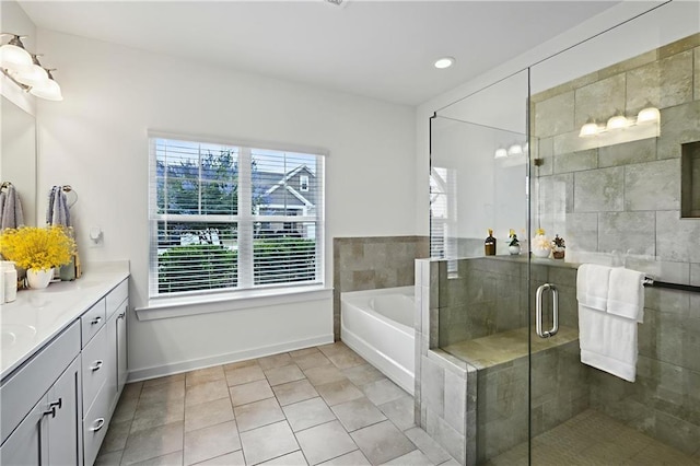 1637 Short Shadow Ln, Snellville, GA 30078 - full bath featuring vanity, a bath, a stall shower, tile patterned floors, and recessed lighting