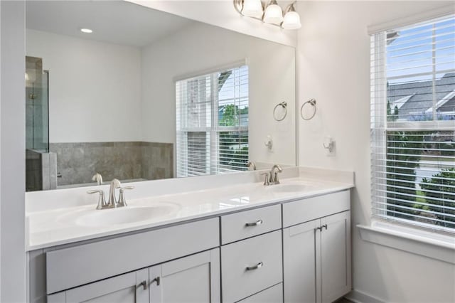 1637 Short Shadow Ln, Snellville, GA 30078 - full bath with double vanity, plenty of natural light, and an enclosed shower