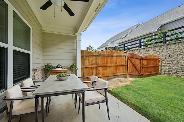 1637 Short Shadow Ln, Snellville, GA 30078 - view of patio / terrace with a ceiling fan and outdoor dining space