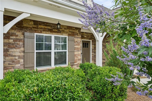 1637 Short Shadow Ln, Snellville, GA 30078 - view of exterior entry featuring stone siding