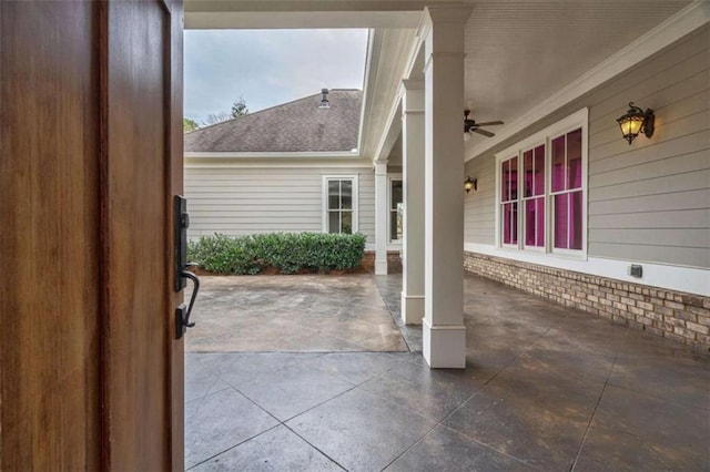 view of patio / terrace featuring ceiling fan