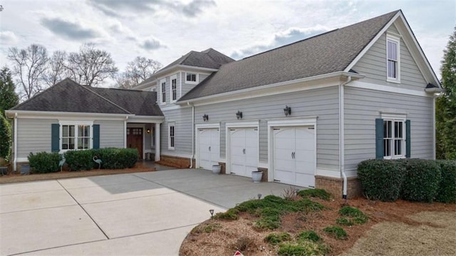 front facade with a garage