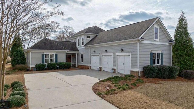 front facade with a garage