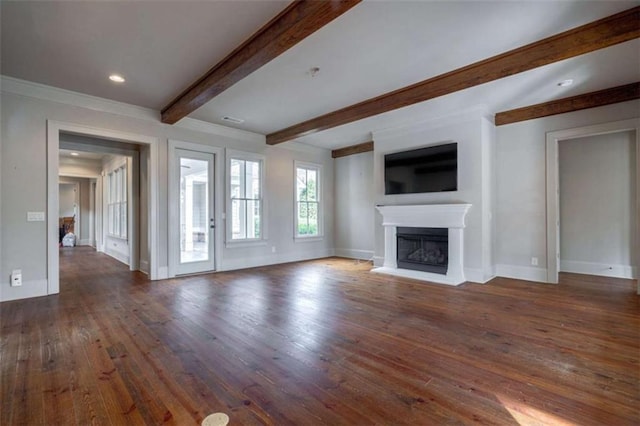 unfurnished living room featuring dark hardwood / wood-style flooring and beamed ceiling