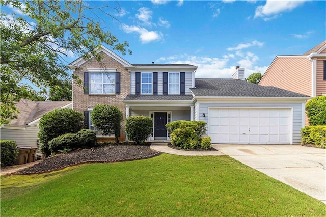 11885 Carriage Park Ln, Duluth, GA 30097 - traditional home featuring concrete driveway, an attached garage, a front lawn, a chimney, and brick siding